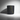 Half Revealed 12 oz leather and suede candle by A’OLA LUX in a matte charcoal vessel.